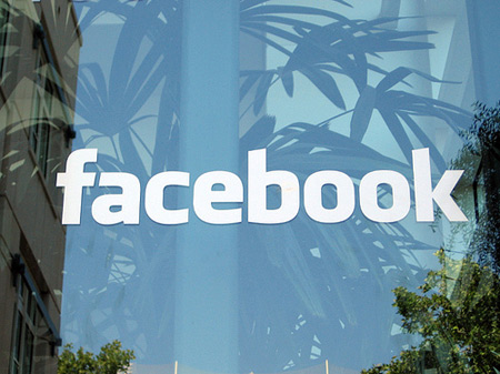 Facebook logo on glass